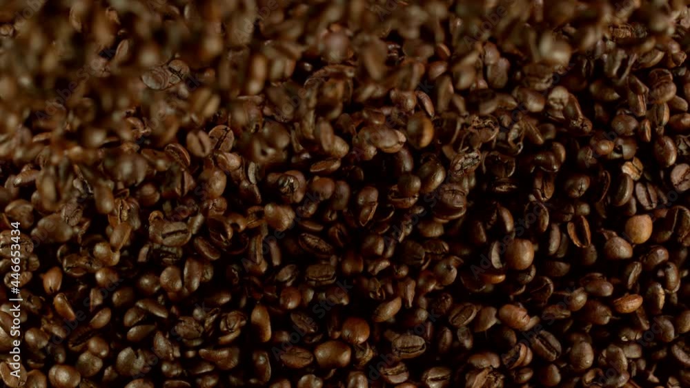 Super slow motion of falling coffee beans. Filmed on high speed cinema camera, 1000 fps. Super slow motion of falling coffee beans. Filmed on high speed cinema camera, 1000 fps.