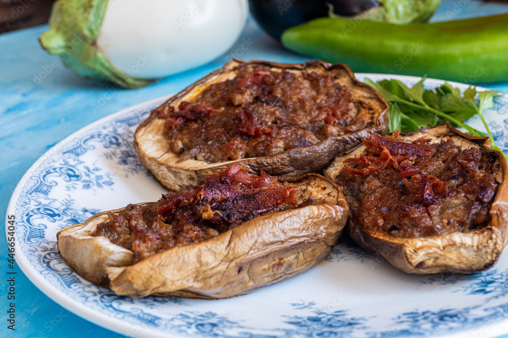 Aubergines stuffed with minced meat with serrano ham, baked in the oven Aubergines stuffed with minced meat with serrano ham, baked in the oven