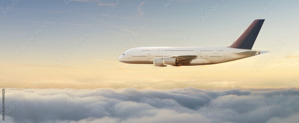 Passengers commercial airplane flying above clouds Passengers commercial airplane flying above clouds