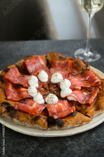 Traditional Italian pizza with sausage and ricotta