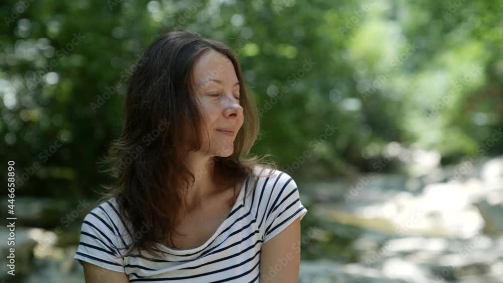 portrait of an adult woman with natural beauty on the street during the day portrait of an adult woman with natural beauty on the street during the day