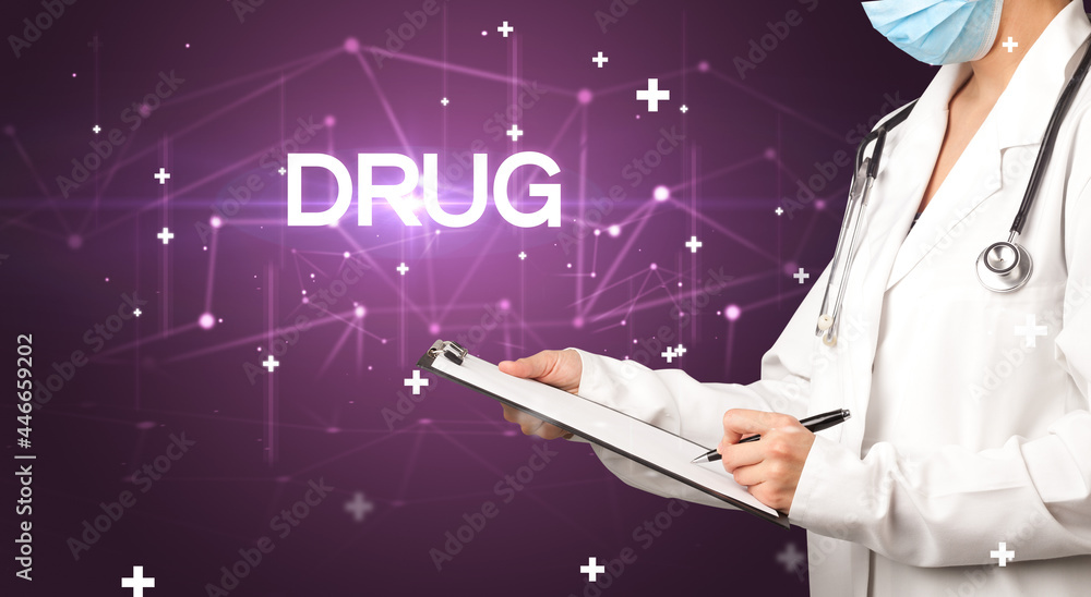 Doctor fills out medical record Doctor fills out medical record