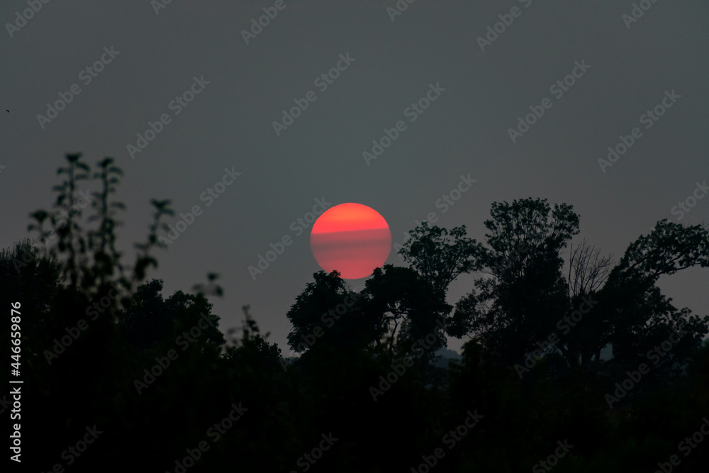 Red Sunset over Virginia as a result of atmospheric smoke related to climate change wildfires in the western United States. Red Sunset over Virginia as a result of atmospheric smoke related to climate change wildfires in the western United States.