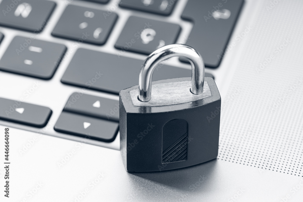 Computer Security, data security protection concept. Closed padlock on modern laptop Computer Security, data security protection concept. Closed padlock on modern laptop