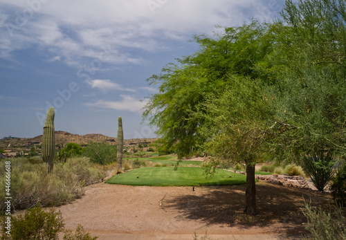 A high definition aerial view of a golf course located in the southwestern United States. photo