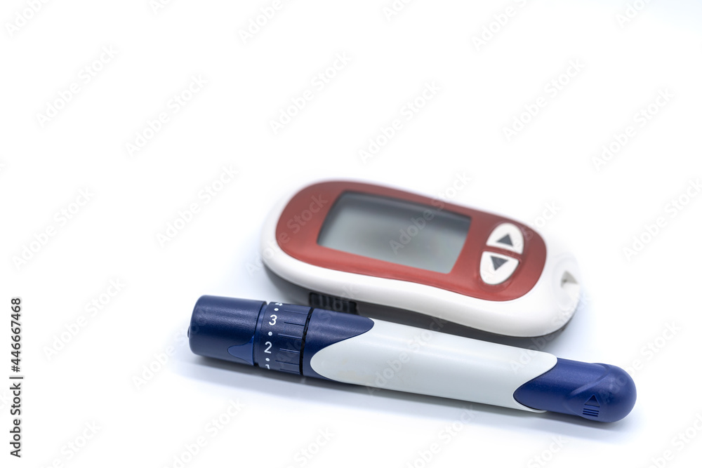 Closeup of Glucose meter with lancet on white background Use as Medicine, diabetes, glycemia, health care and people concept. Closeup of Glucose meter with lancet on white background Use as Medicine, diabetes, glycemia, health care and people concept.