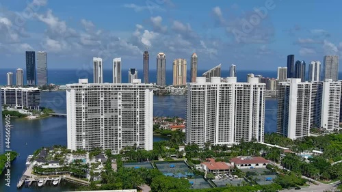 Williams Island Aerial Fly south skyline of condo Buildings and Water