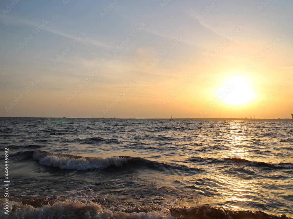 Sunset on the coast of the bay