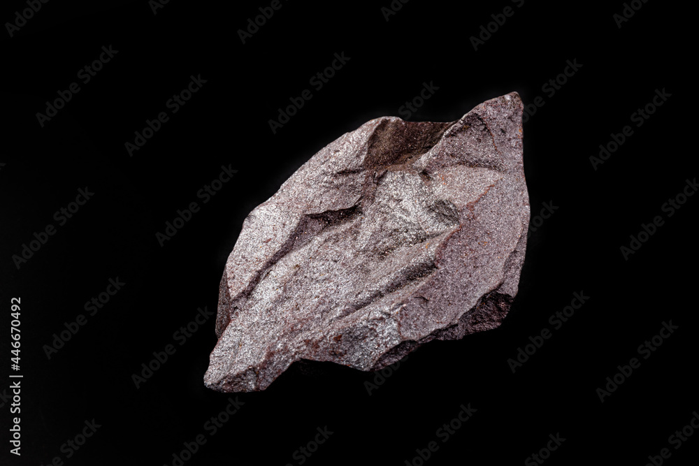 Iron ore on isolated black background, metal used in metallurgical industry. Iron ore on isolated black background, metal used in metallurgical industry.