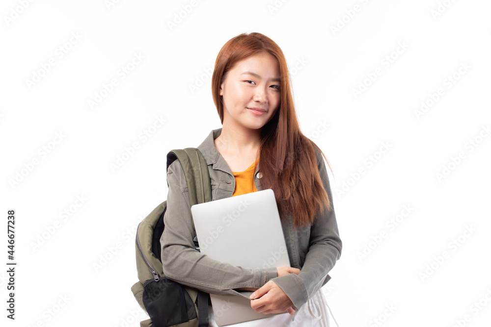 Portrait of happy casual Asian girl student with backpack and laptop isolated on white background. Back to school and learning concept. Portrait of happy casual Asian girl student with backpack and laptop isolated on white background. Back to school and learning concept.