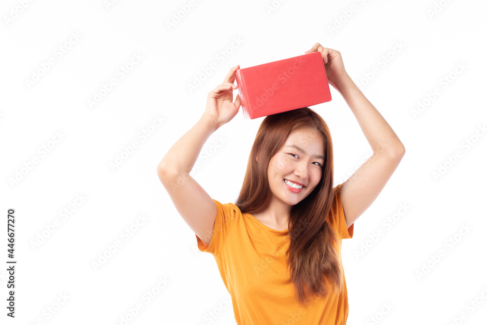 Attractive Asian woman holding gift box in christmas, new year, valentine day, birthday celebration concept. Portrait of smiling happy pretty girl hold gift box isolated on white with copy space. Attractive Asian woman holding gift box in christmas, new year, valentine day, birthday celebration concept. Portrait of smiling happy pretty girl hold gift box isolated on white with copy space.