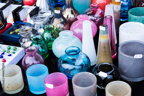 Vases, candle holders and colored glass jewelry.