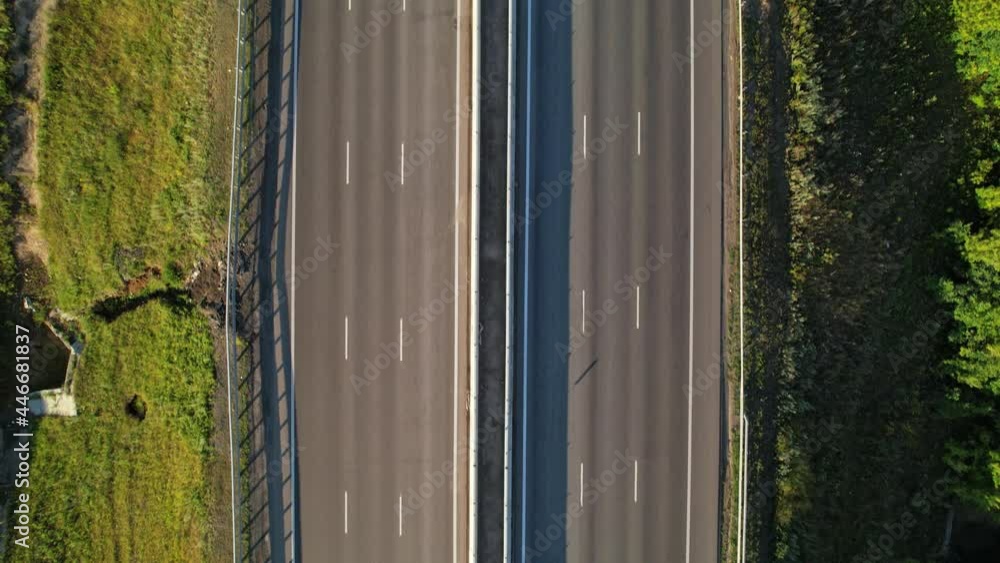 Aerial view of the highway where cars are passing. Aerial view of the highway where cars are passing.