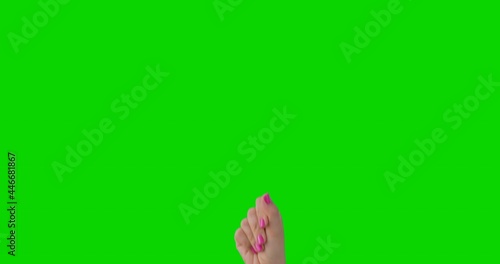 Isolated Woman Hand with Pink Manicure Snapping Fingers Sign Symbol. Green Screen Compositing. Pack of Gestures Movements on Keyed Chroma Key Background. Body Language.  photo