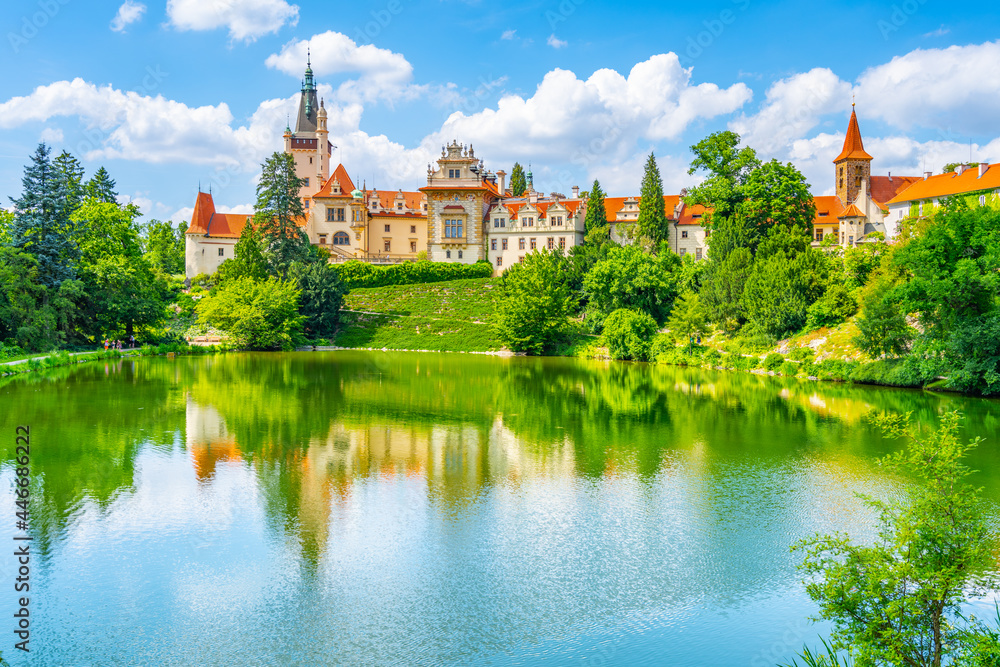 Pruhonice castle and natural park landscape with garden lake on sunny summer day, Pruhenice, Czech Republic. UNESCO World Heritage Site Pruhonice castle and natural park landscape with garden lake on sunny summer day, Pruhenice, Czech Republic. UNESCO World Heritage Site