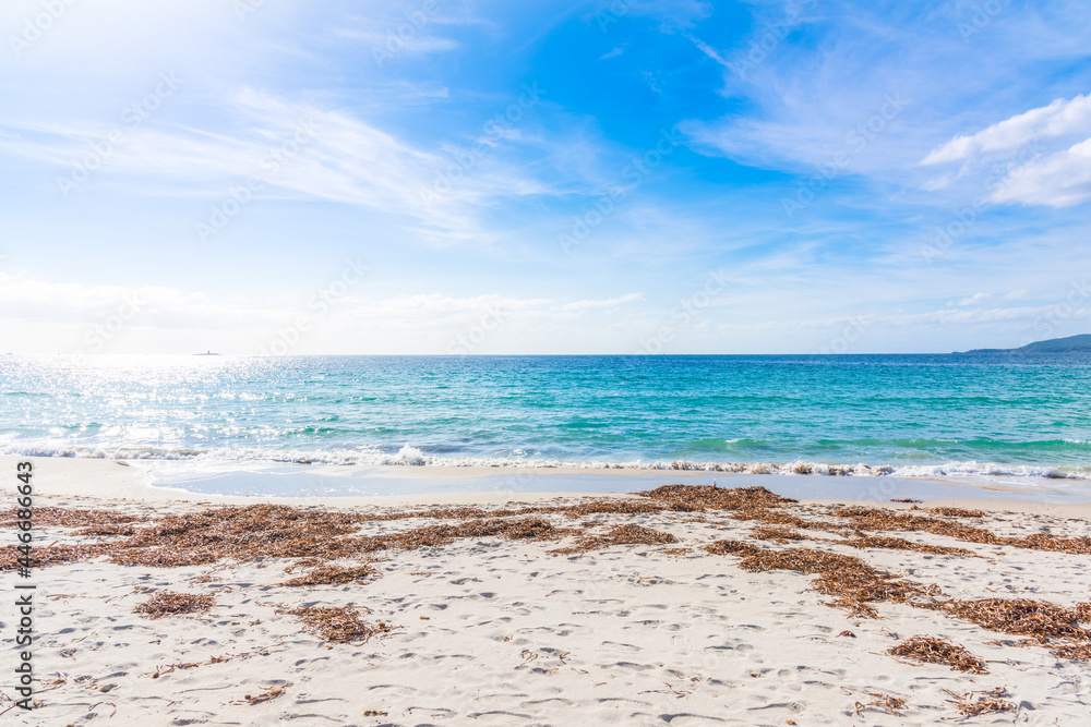 White sand and blue sea in Maria Pia beach