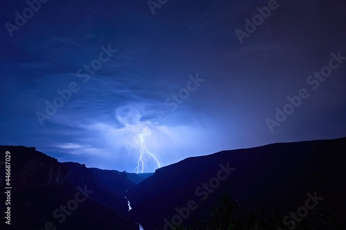 Wallpaper Mural lightning over the mountains Torontodigital.ca