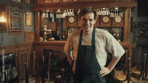 Portrait of man owner barman cafe or restaurants and business reopen after coronavirus quarantine is over. Small business post covid lockdown.