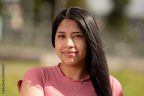 portrait of Hispanic woman, looking towards the camera