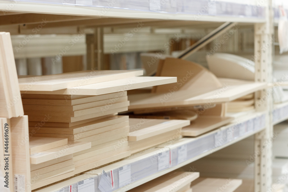 Different shelves for furniture on a shelf in a store, selective focus. Different shelves for furniture on a shelf in a store, selective focus.