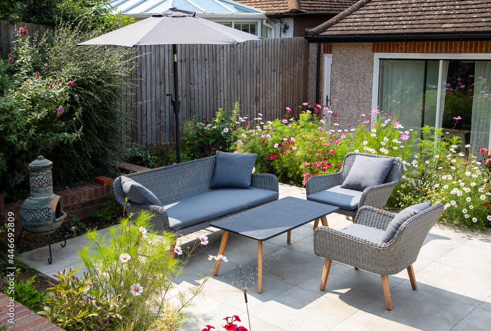 Garden furniture on the terrace on sunny day - obrazy, fototapety, plakaty 