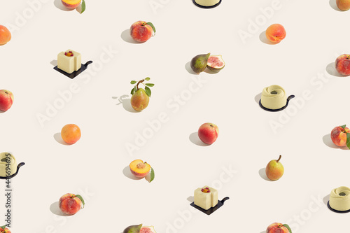 Fototapeta Naklejka Na Ścianę i Meble -  Cute, summer party food pattern with colorful, ripe, juicy, fruits and desserts made of natural ingredients, isolated on pastel beige background. Minimal organic healthy food texture. Sun and shadows.
