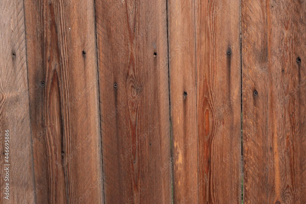 Naklejka premium Wooden fence close up brown