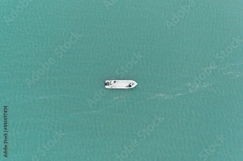 Aerial view of a Fisheman's boat with fishing gear during high tide in Pointe de la Fumee, Fouras, Moeze-Oleron Nature Reserve, Charente Maritime, France. photo