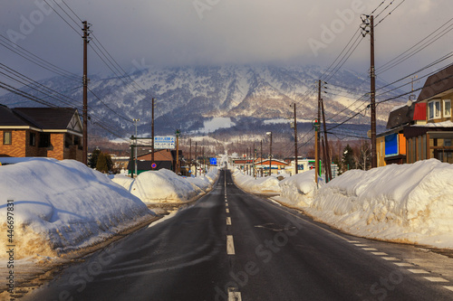 Beautiful Winter Landscape with Winter forest under the snow   powder snow on a road in  Hokkaido Japan view from inside car.