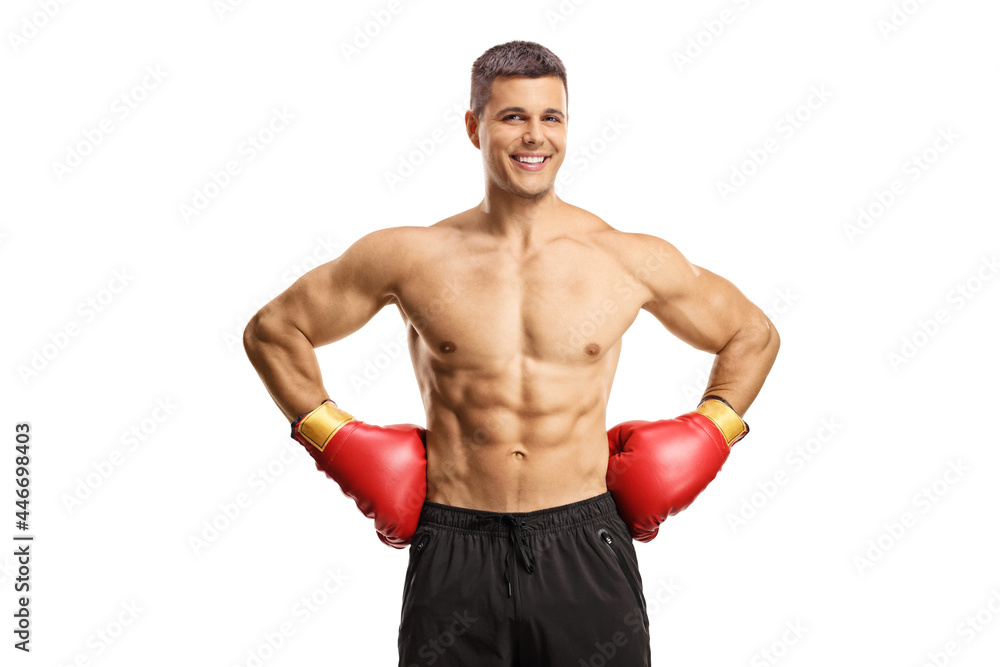 Shirtless male boxer with gloves smiling at camera Shirtless male boxer with gloves smiling at camera