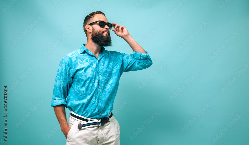 Portrait of handsome, young, stunning, perfect, manly man successful macho man with beard wearing casual isolated color background Portrait of handsome, young, stunning, perfect, manly man successful macho man with beard wearing casual isolated color background