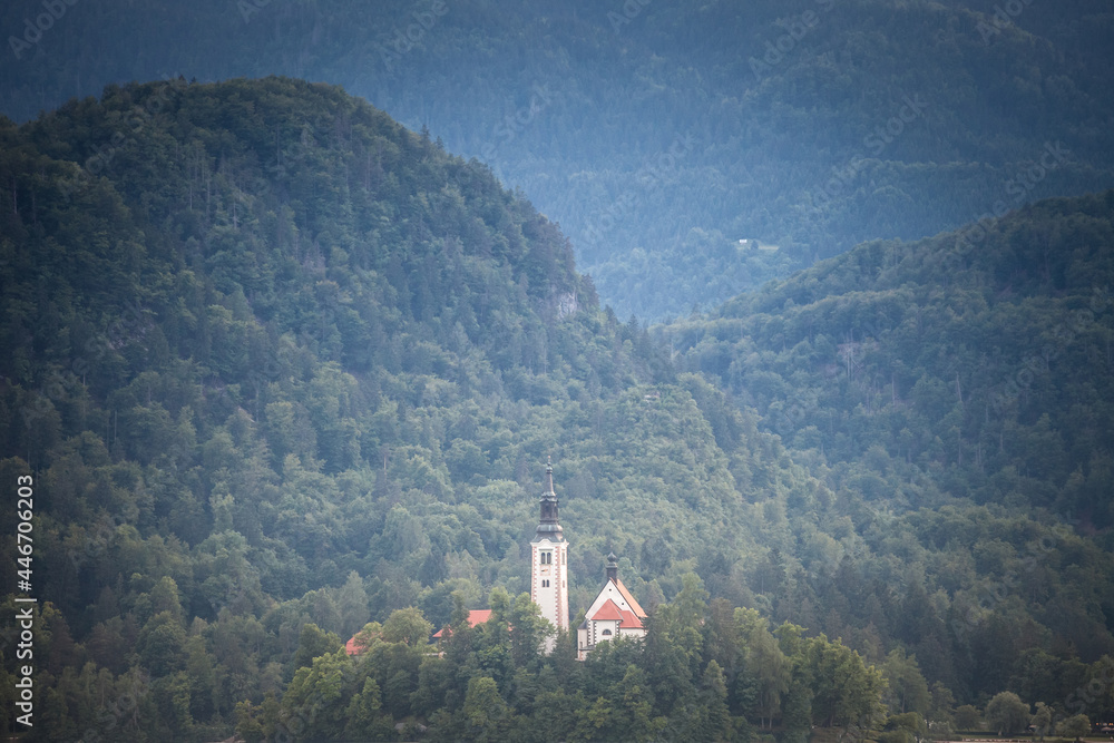  Panorama of the Blejsko ostrvo, or bled island, on Bled lake or Blejsko Jezero, with the assumption of Maria church, or cerkev marijinega vnebovzetja. it's a catholic church and monument of Slovenia.