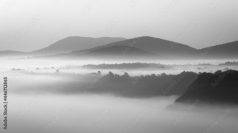 Naklejka premium fog over the mountains