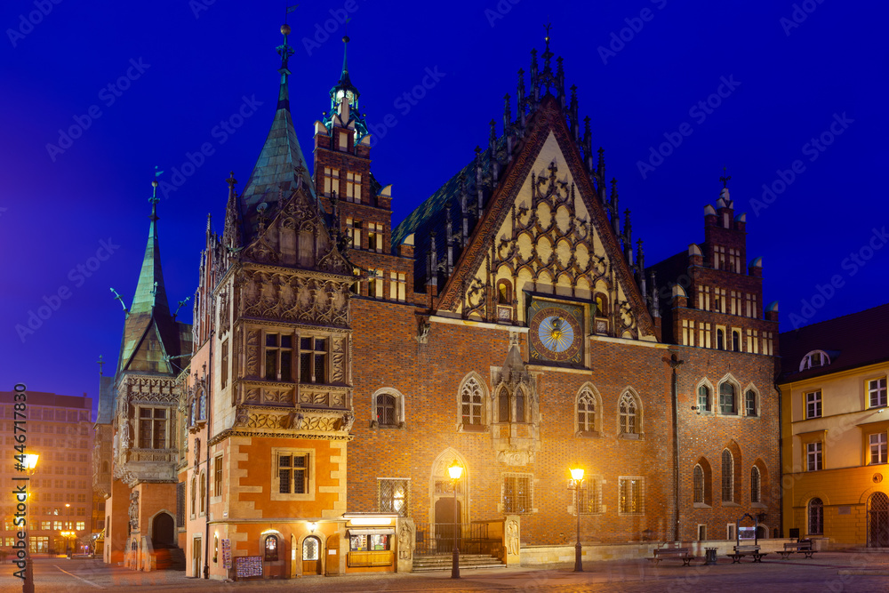 Night view of illuminated Wroclaw Old Town Hall on Market Square in spring, Poland.
