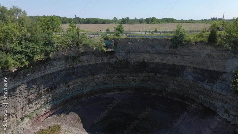 Aerial drone of Devil's Punchbowl in Hamilton, Ontario ,Canada in 4k. The waterfall was dry due to the dry weather. Aerial drone of Devil's Punchbowl in Hamilton, Ontario ,Canada in 4k. The waterfall was dry due to the dry weather.