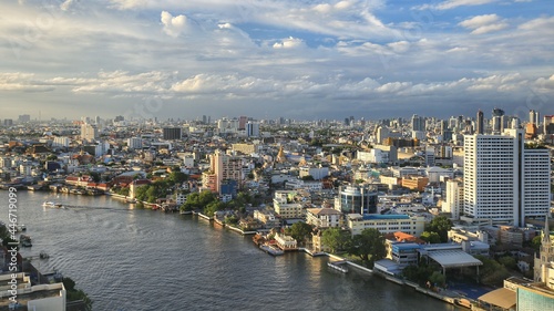 aerial panoramic landscape view of urban area with Chao Phraya River in Bangkok, Thailand © Pornprasert