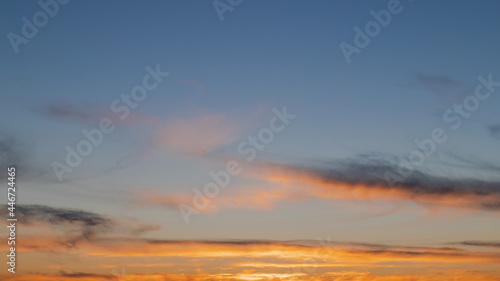 Beautiful blue orange colored sunset sky. © AlexandraDaryl