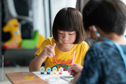child paint color on paper, education concept