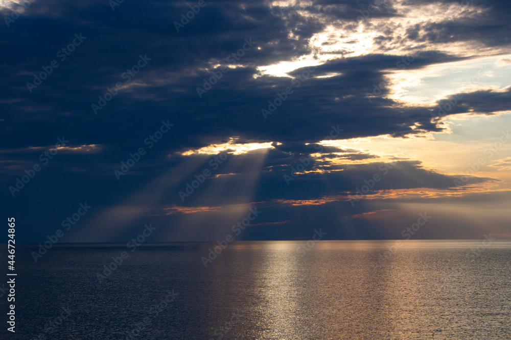 Sunset on the Sea of Azov. Beautiful landscape with an evening sunset sky over a calm sea