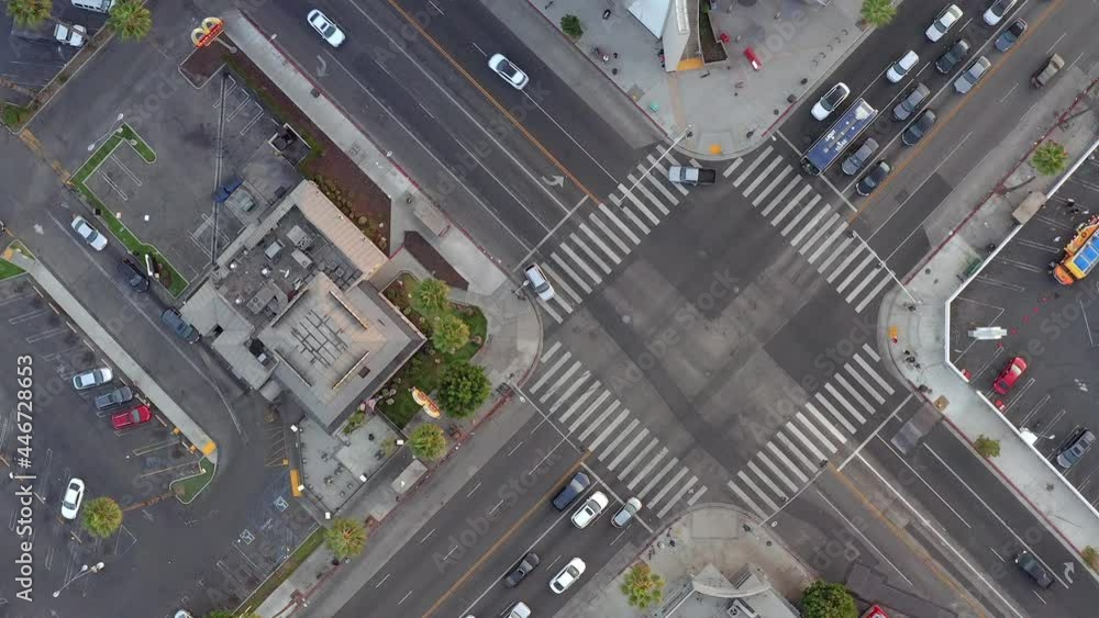 Aerial, above view of people driving in the city, drone view Aerial, above view of people driving in the city, drone view