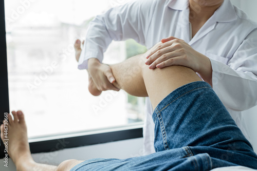 Man patients consulted physiotherapists with knee pain problems for examination and treatment. Rehabilitation physiotherapy concept