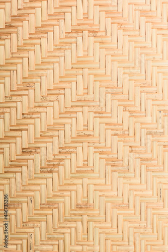 Abstract background of brown woven bamboo, Asian handicrafts, natural materials, products. Sustainability concept.