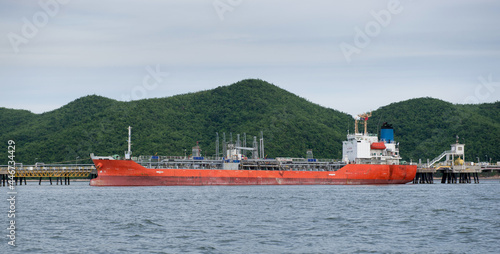 Chemical tanker ship is berthing at shore for cargo operation.