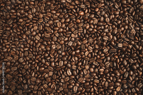 Premium Roasted coffee beans on background