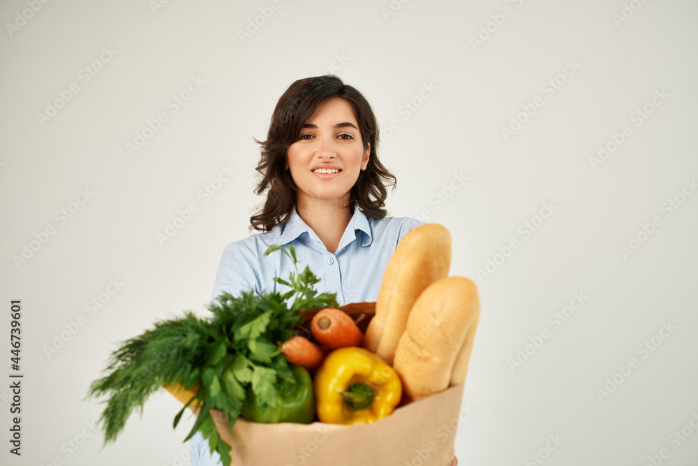 woman in blue shirt package with groceries in supermarket healthy food shopping woman in blue shirt package with groceries in supermarket healthy food shopping