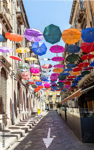 Street decorated with colored umbrellas. © Jane Vershinin