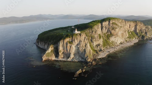 Lighthouse Baluzek on the coast of the Sea of Japan photo