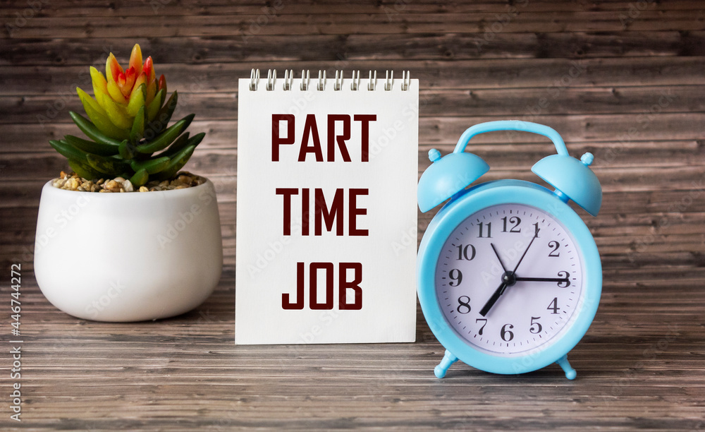 part time job text written on notepad and wooden table with clock and cactus flower part time job text written on notepad and wooden table with clock and cactus flower