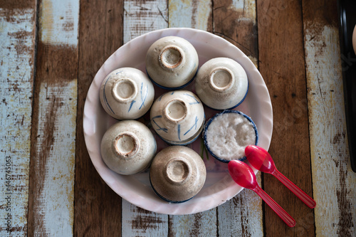 Thai Coconut Milk Custard - Khanom Thuai (Thai dessert) - Thai Coconut Milk Custard is a traditional dessert with 3 main ingredients (flour, coconut milk and palm sugar). photo