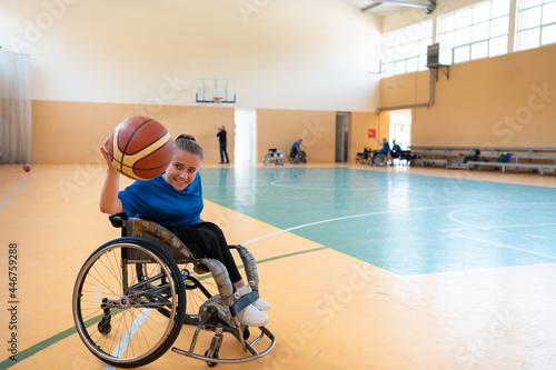 photo of the basketball team of war invalids with professional sports equipment for people with disabilities on the basketball court